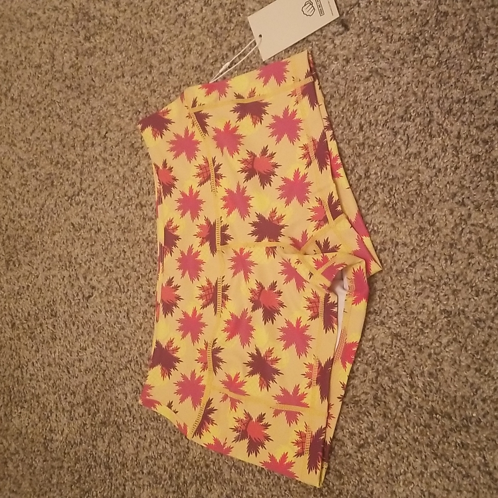 Feed Me Fight Me pineapple and leave shorts